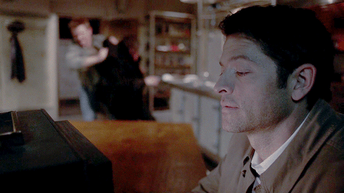 Cas protecting his TV while the Devil and King of Hell battle it out in his mind palace-kitchen. 11x18 Hell's Angel